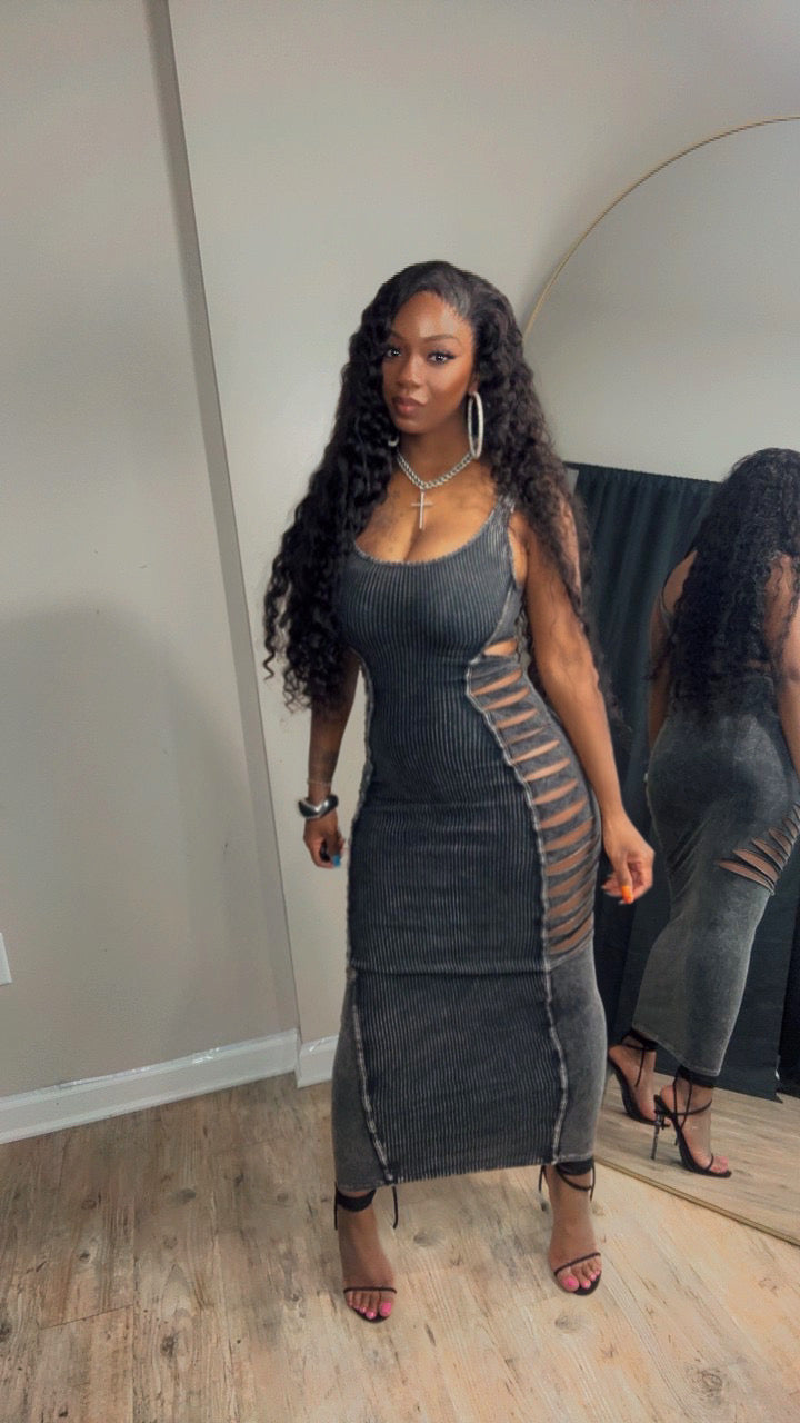 She is 5'2 modeling a dark gray ribbed knit midi dress with side cutouts and sheer mesh panels. /with headband